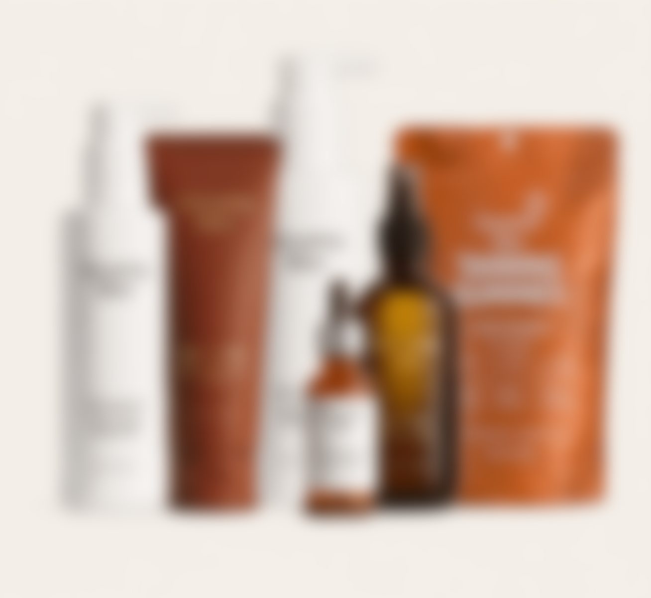 Blurred competitor self-tanning range for comparison
